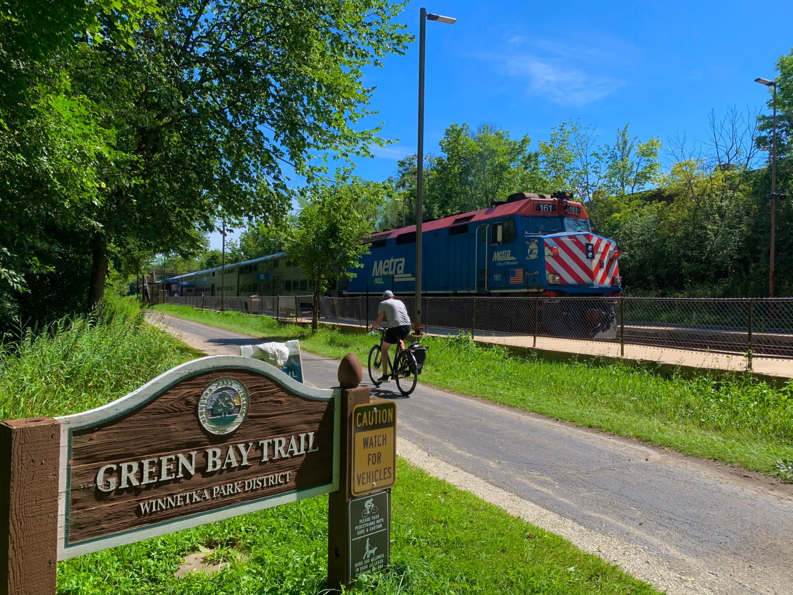 Cyclist and Metra UPNL Train